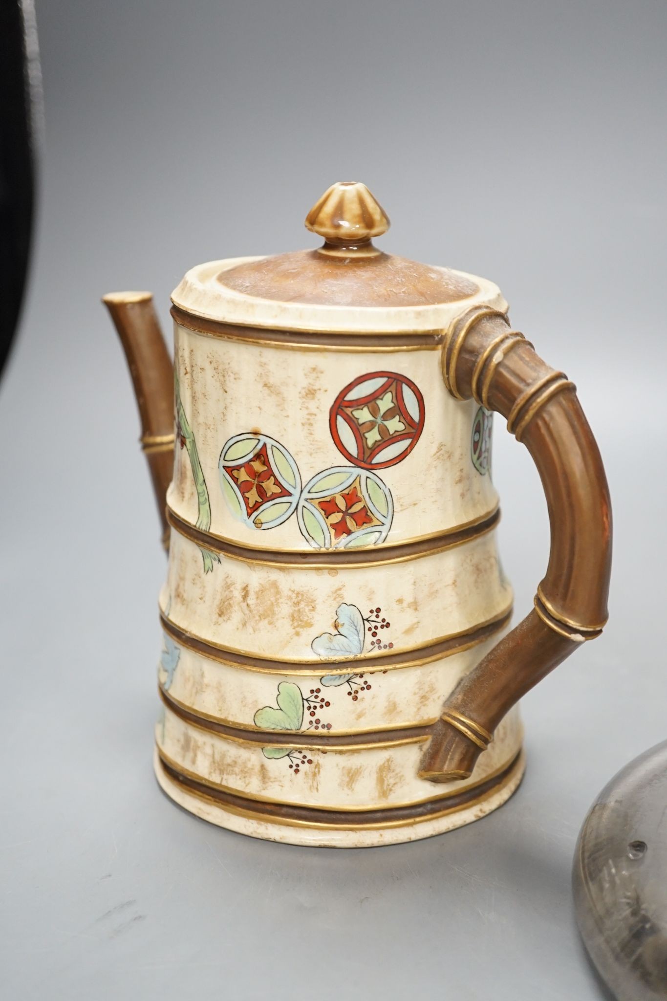 A Royal Worcester Japanese taste coffee pot and a Victorian glass squat shaped inkwell, with a brass lid (2)